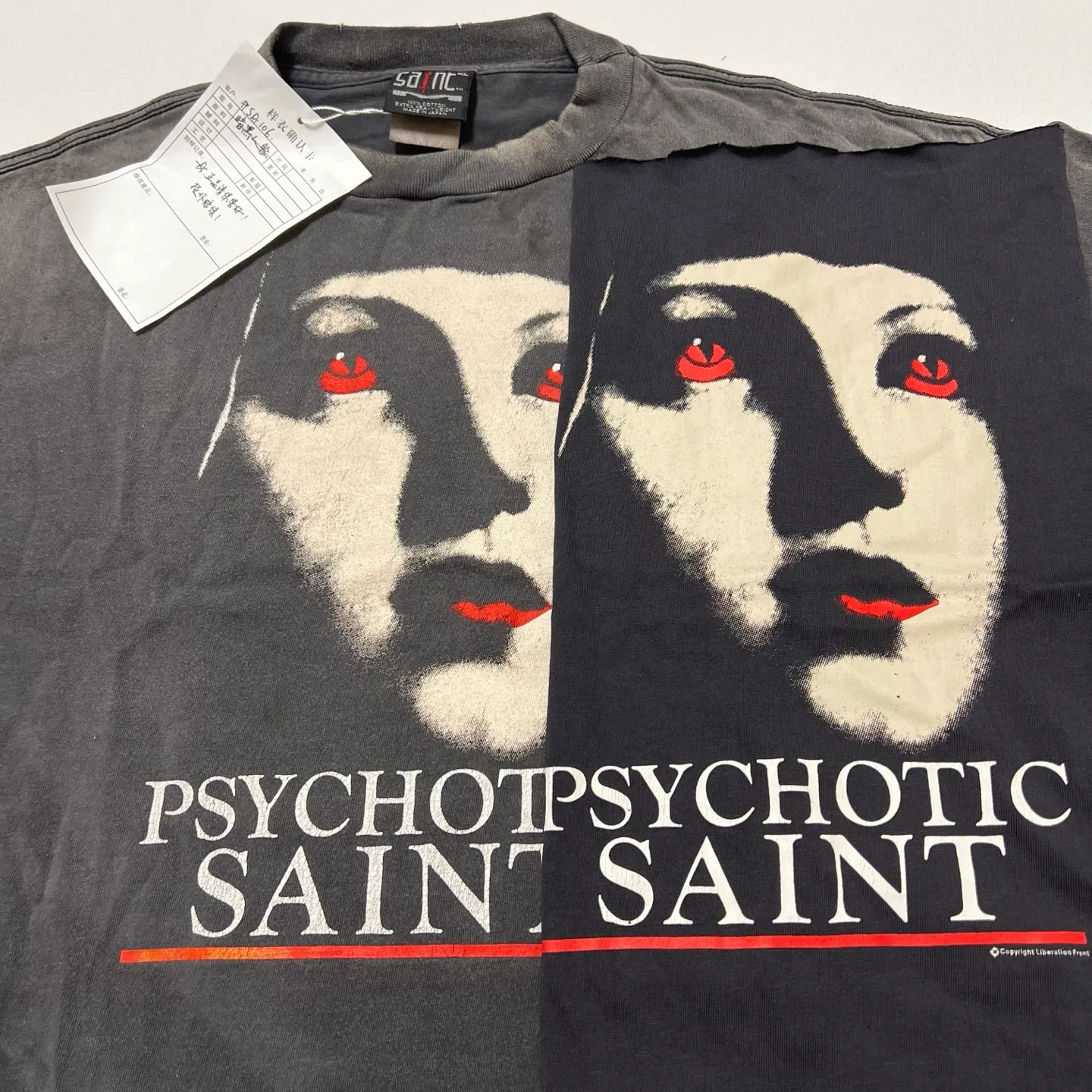 Printing proofing comparison SAINT Mxxxxxx SS TEE/PSYCHOTIC SNT/BLK Gothic heavy metal rock style retro short-sleeved Mysterious woman's face printed distressed TEE Washed black S-XL Same as the original version Cylindrical side seam OE gauze fabric Garment dyeing Faded by heavy washing Bust with plaster fading Correct matching Original consistent accessories